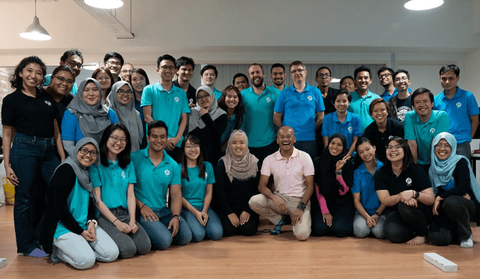 Azran Osman-Rani with his team at Naluri